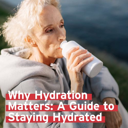 Senior women drinking water out of water bottle