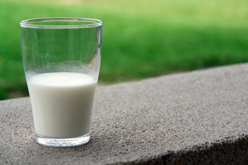 glass of milk on table