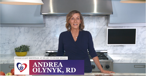 Dietitian Andrea Olynyk standing in kitchen